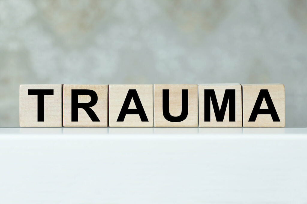 Wooden blocks that spell the word Trauma. EMDR Therapy in Washington, DC can help you effectively process trauma and begin healing.