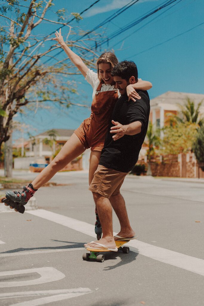 A couple shares a ride on a skateboard during a date representing someone who has overcome dating anxiety with the help of Therapy for Anxiety in Washington, DC. 