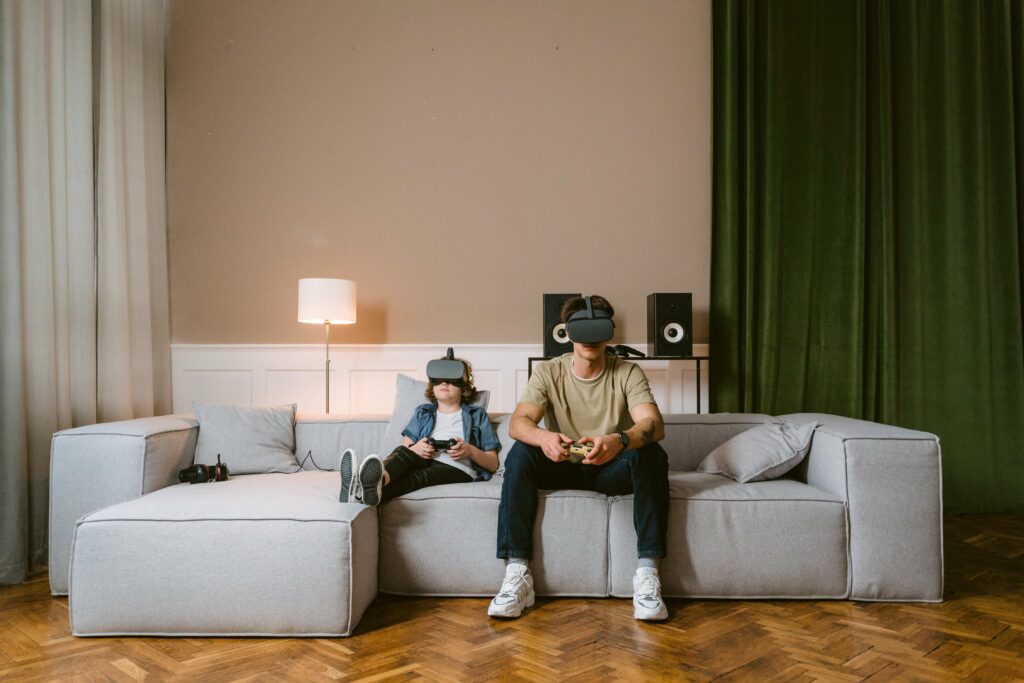 A parent and child play VR together during the holiday season in order to overcome holiday anxiety in Washington, DC.