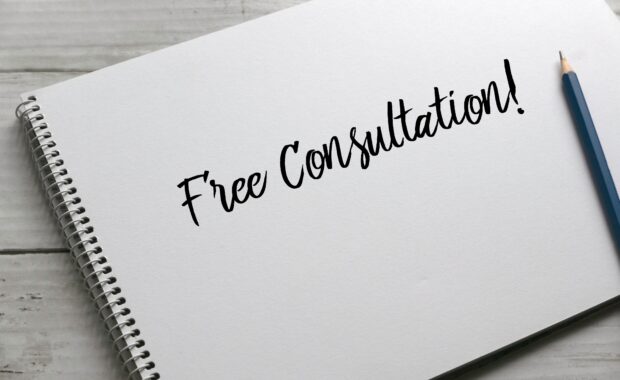 Handwritten "Free Consultation!" text in notebook representing free mental health consultation DC services offered