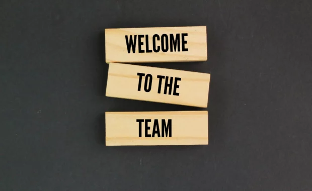 Wooden blocks spelling "Welcome to the Team". We are announcing new staff members Emily Wahlgren and Jasmine Phillips, who recently joined DCNE for testing and therapy in the DMV area.
